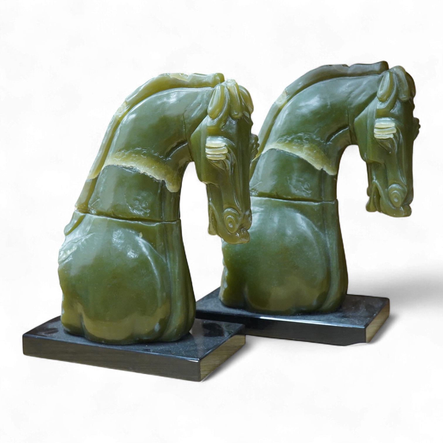 Two Austin V&A sculptures, simulated jade horses ornaments, 32cm high